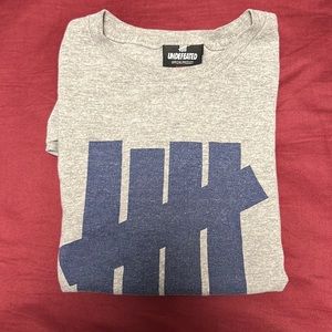 UNDEFEATED SMALL GREY TEE